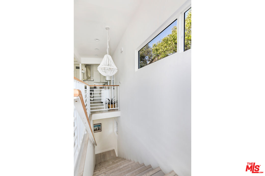 3922 Roderick Road Los Angeles, CA 90065 - Photo 15 of 29 a room with a sink and a mirror