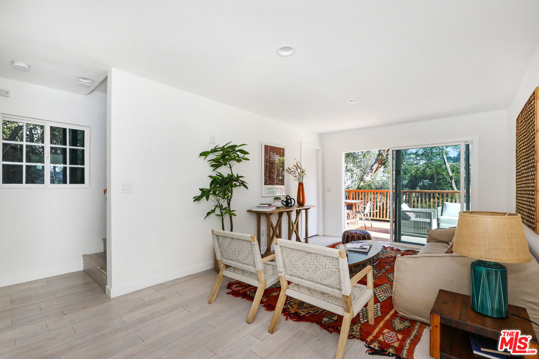 3922 Roderick Road Los Angeles, CA 90065 - Photo 16 of 29 a living room with furniture and a potted plant