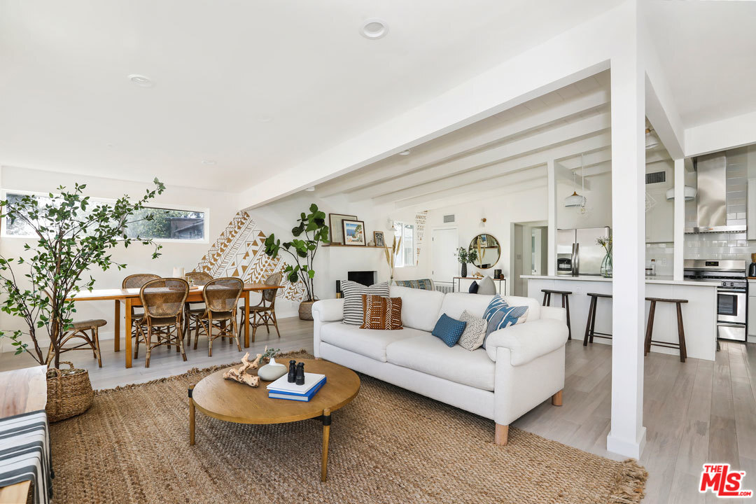 3922 Roderick Road Los Angeles, CA 90065 - Photo 2 of 29 a living room with furniture and a wooden floor
