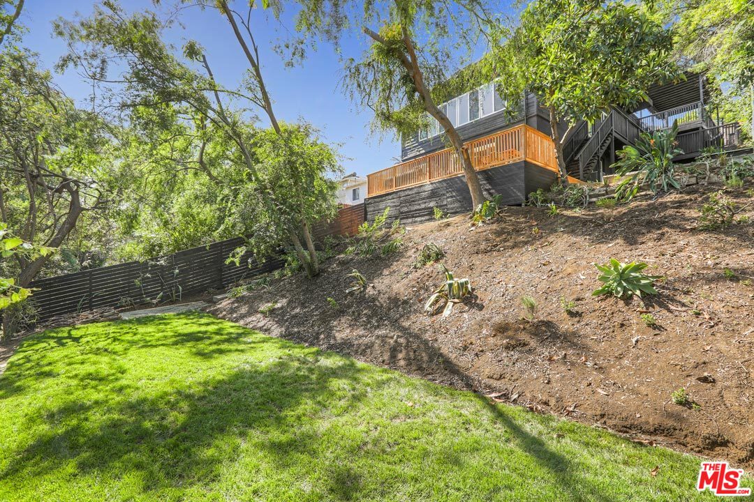 3922 Roderick Road Los Angeles, CA 90065 - Photo 23 of 29 a backyard of a house with lots of green space