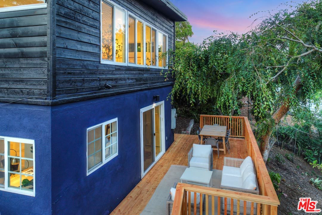 3922 Roderick Road Los Angeles, CA 90065 - Photo 26 of 29 a view of roof deck with wooden floor and seating space