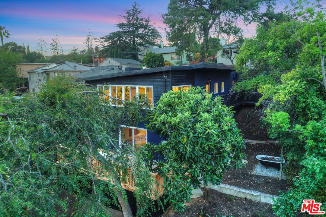 3922 Roderick Road Los Angeles, CA 90065 - Photo 28 of 29 a view of a house with a yard and a sitting area
