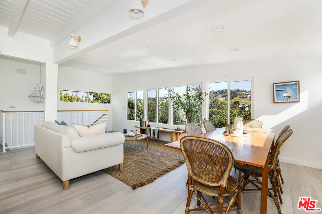 3922 Roderick Road Los Angeles, CA 90065 - Photo 8 of 29 a living room with furniture and a large window
