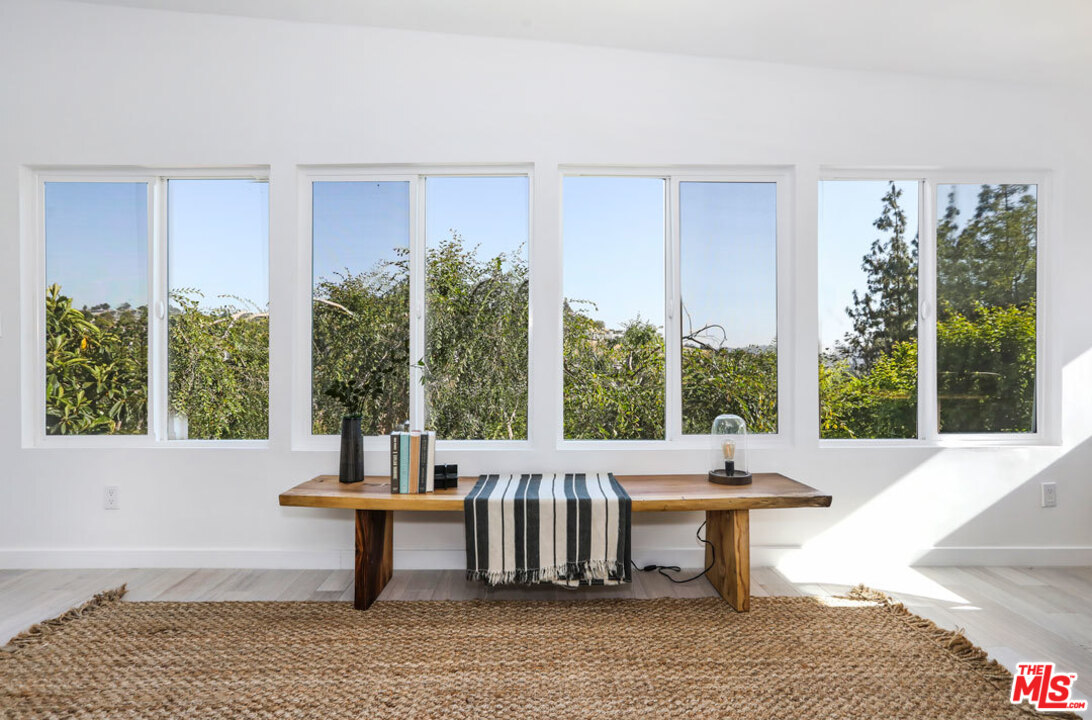 3922 Roderick Road Los Angeles, CA 90065 - Photo 9 of 29 a living room with furniture and a window
