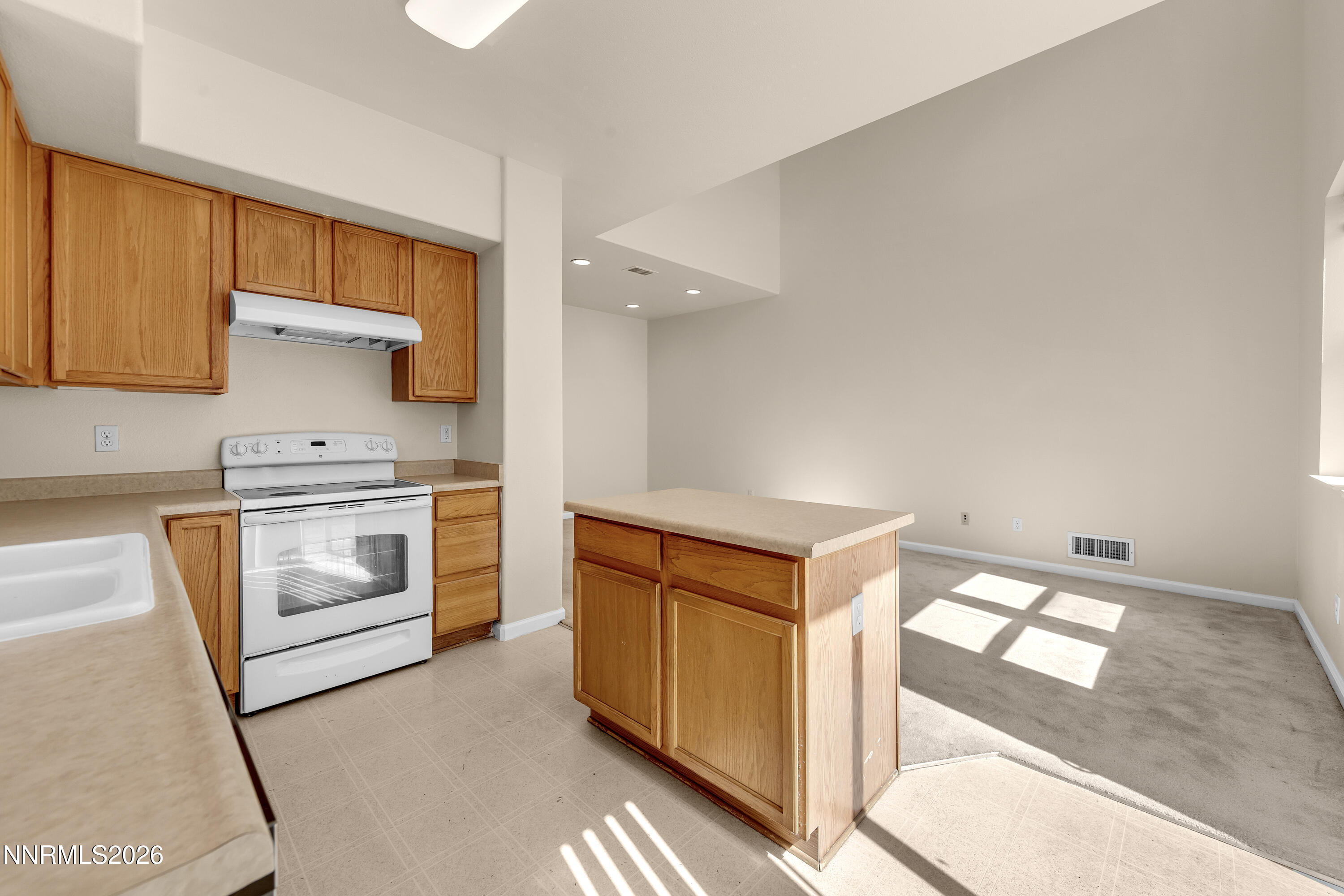 9248 Running Dog Circle Reno, NV 89506 - Photo 10 of 36 Kitchen/Living Room