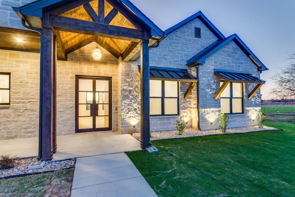 6306 Starlight Ranch Road Godley, TX 76044 - Photo 2 of 40 Lots of lighting, and a custom front door