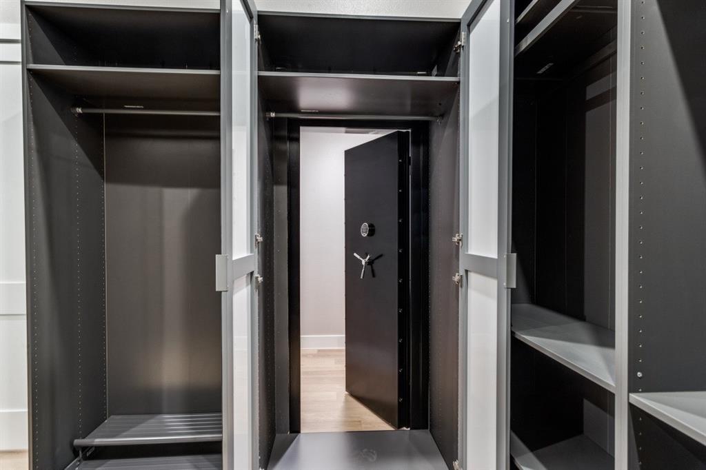 6306 Starlight Ranch Road Godley, TX 76044 - Photo 28 of 40 Safe room/storm shelter behind mirrors in primary closet