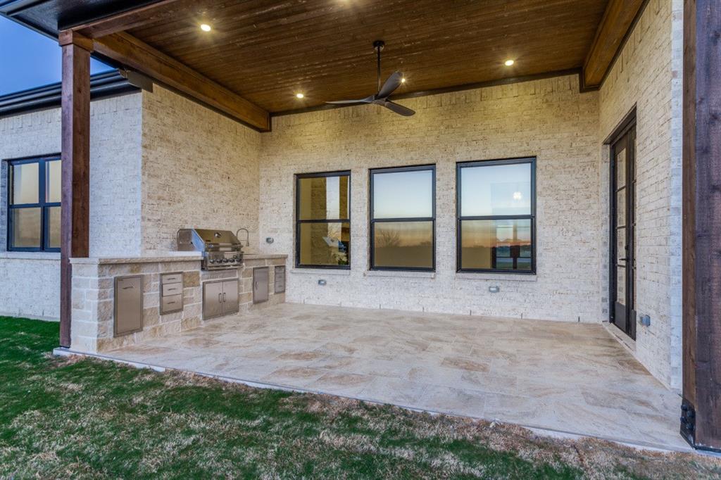 6306 Starlight Ranch Road Godley, TX 76044 - Photo 39 of 40 With built-in grill and sink