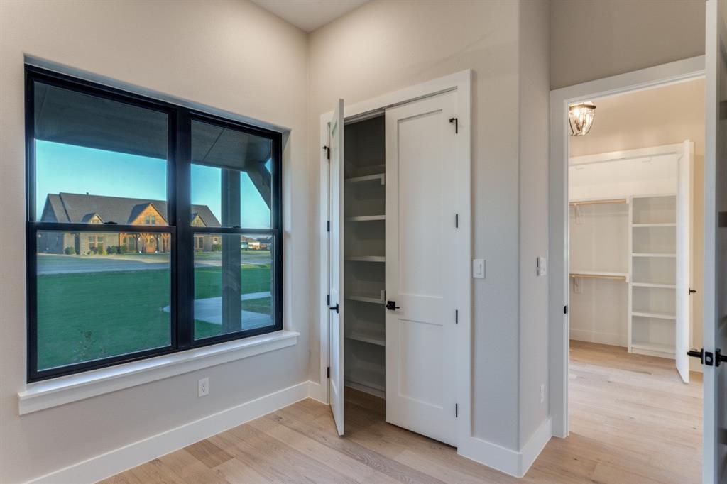 6306 Starlight Ranch Road Godley, TX 76044 - Photo 7 of 40 Bedroom off the front entry, but would make a great office.