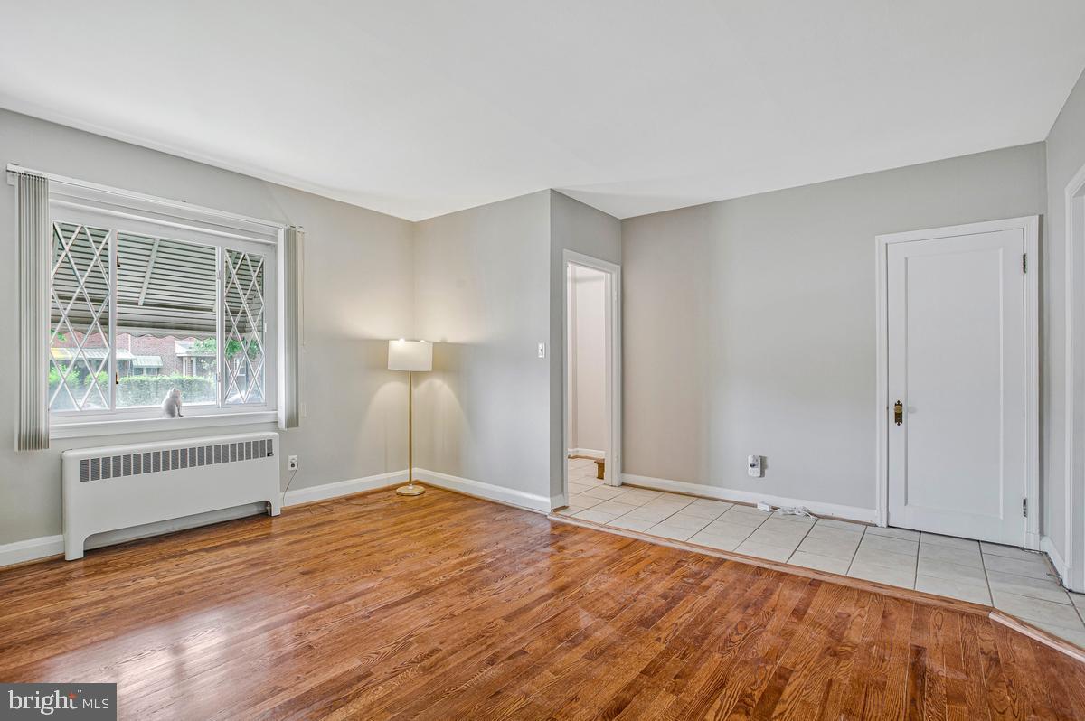 3040 Federal Street Baltimore, MD 21213 - Photo 10 of 41 a view of empty room with wooden floor and fan