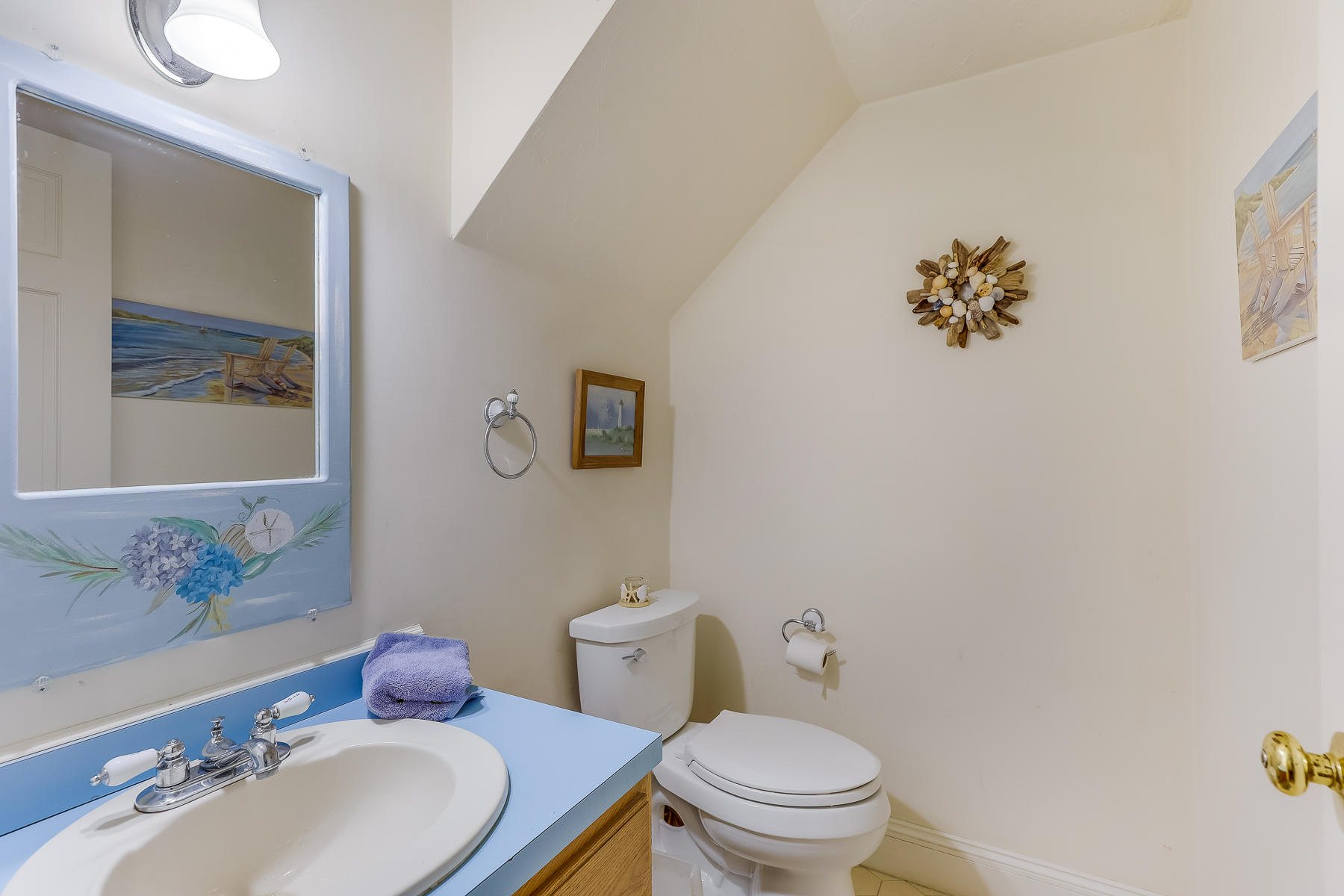 3420 Main Street, Unit 3 Barnstable, MA 02630 - Photo 12 of 28 a bathroom with a toilet a sink and mirror
