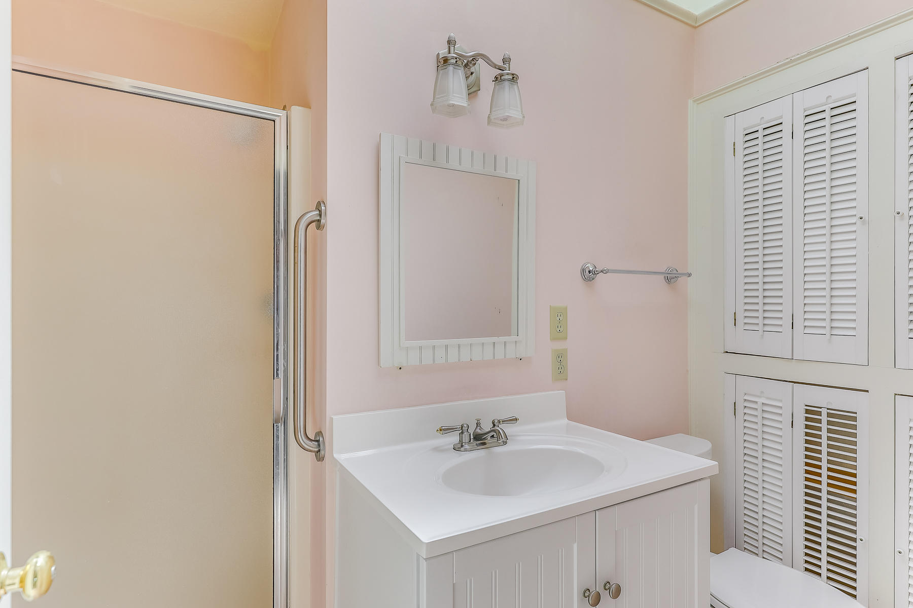 3420 Main Street, Unit 3 Barnstable, MA 02630 - Photo 16 of 28 a bathroom with a sink and a mirror