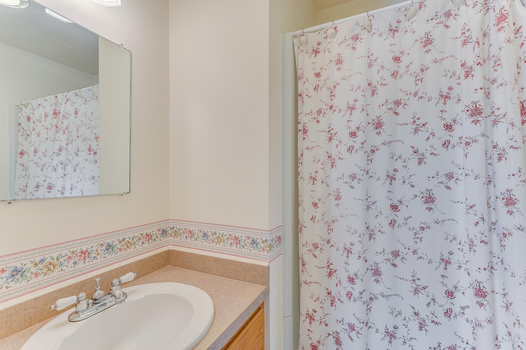 3420 Main Street, Unit 3 Barnstable, MA 02630 - Photo 18 of 28 a bathroom with a shower and a sink