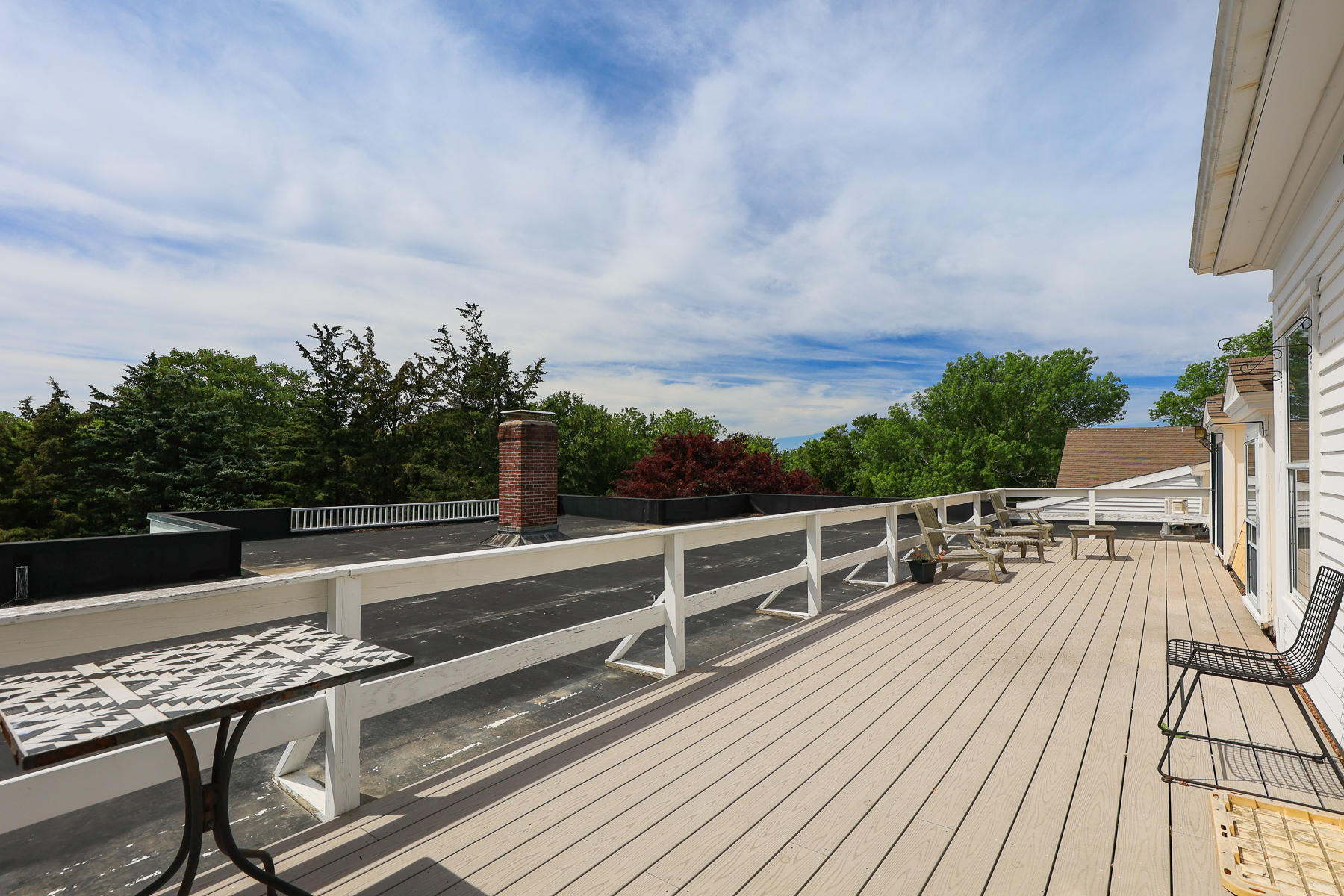 3420 Main Street, Unit 3 Barnstable, MA 02630 - Photo 21 of 28 a view of a terrace with chairs