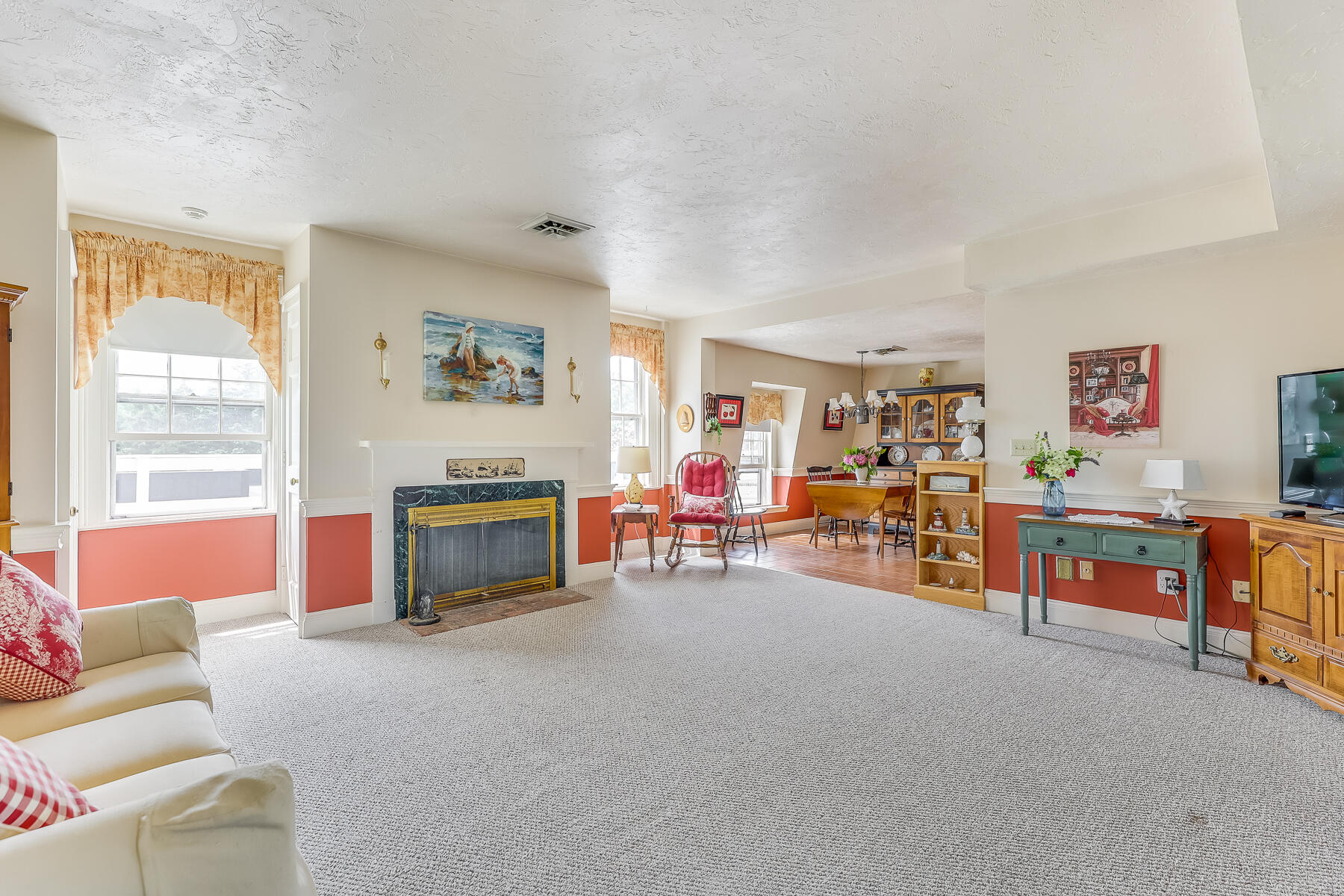 3420 Main Street, Unit 3 Barnstable, MA 02630 - Photo 5 of 28 a living room with furniture and a large window