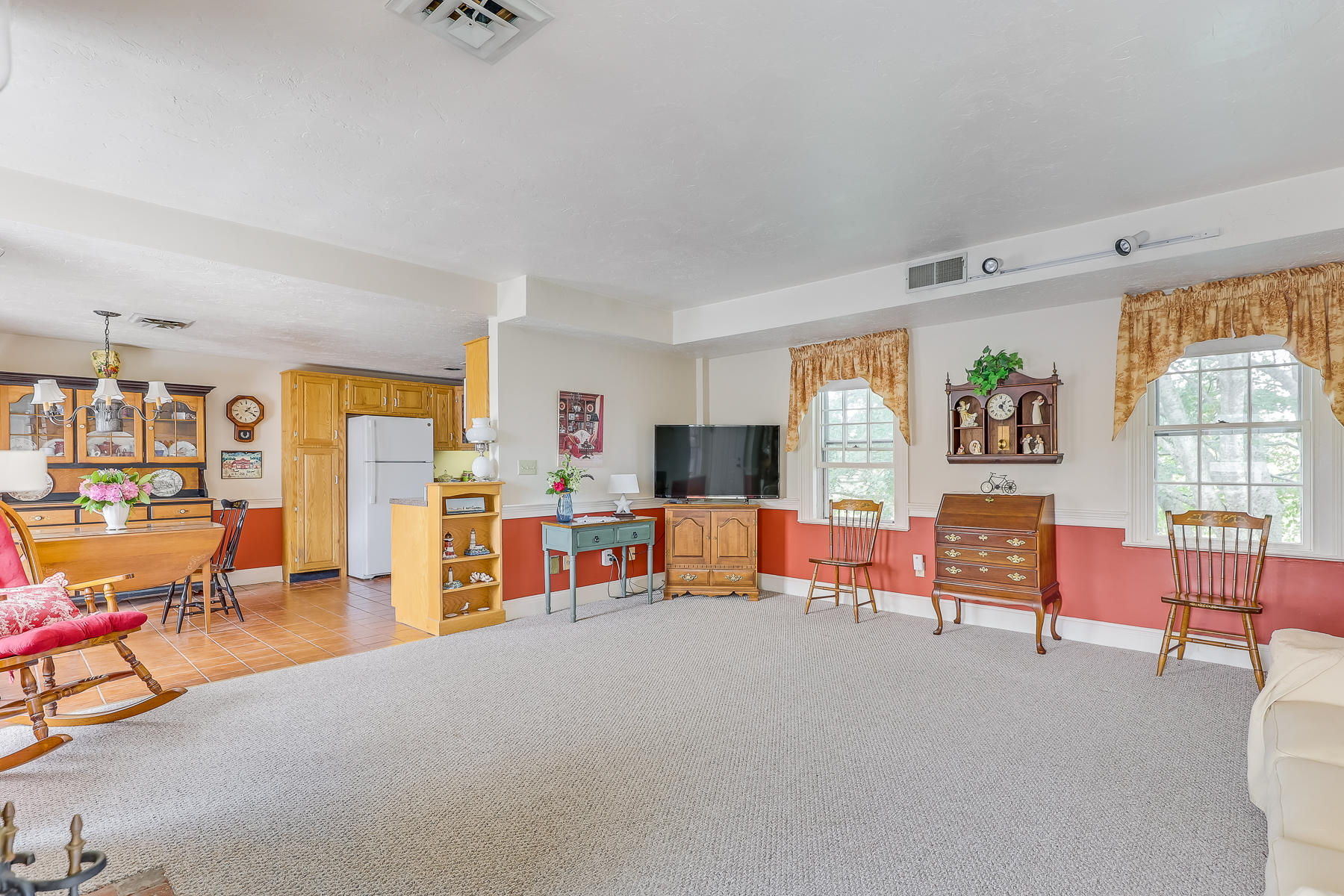 3420 Main Street, Unit 3 Barnstable, MA 02630 - Photo 7 of 28 wooden floor in livingroom with furniture and window