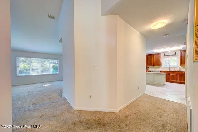a spacious bathroom with a double vanity sink mirror and