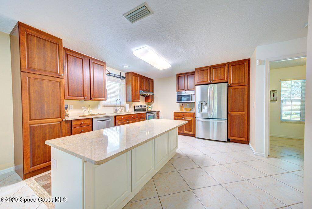 4116 Sparrow Hawk Road Melbourne, FL 32934 - Photo 6 of 70 Updated Kitchen View 5