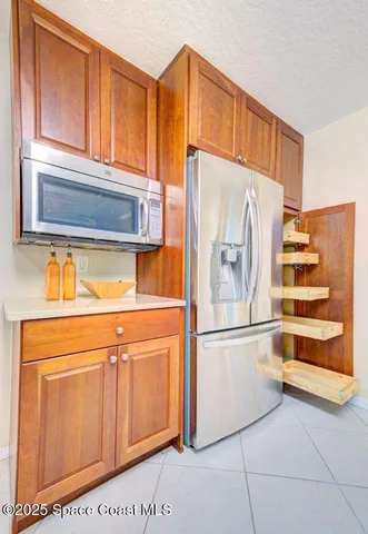 a view of a livingroom with a furniture and a ceiling fan