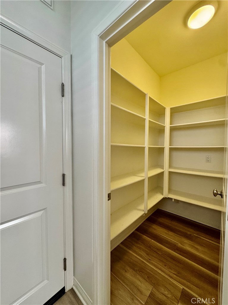51 Elmdale Irvine, CA 92620 - Photo 18 of 41 a view of walk in closet with empty racks