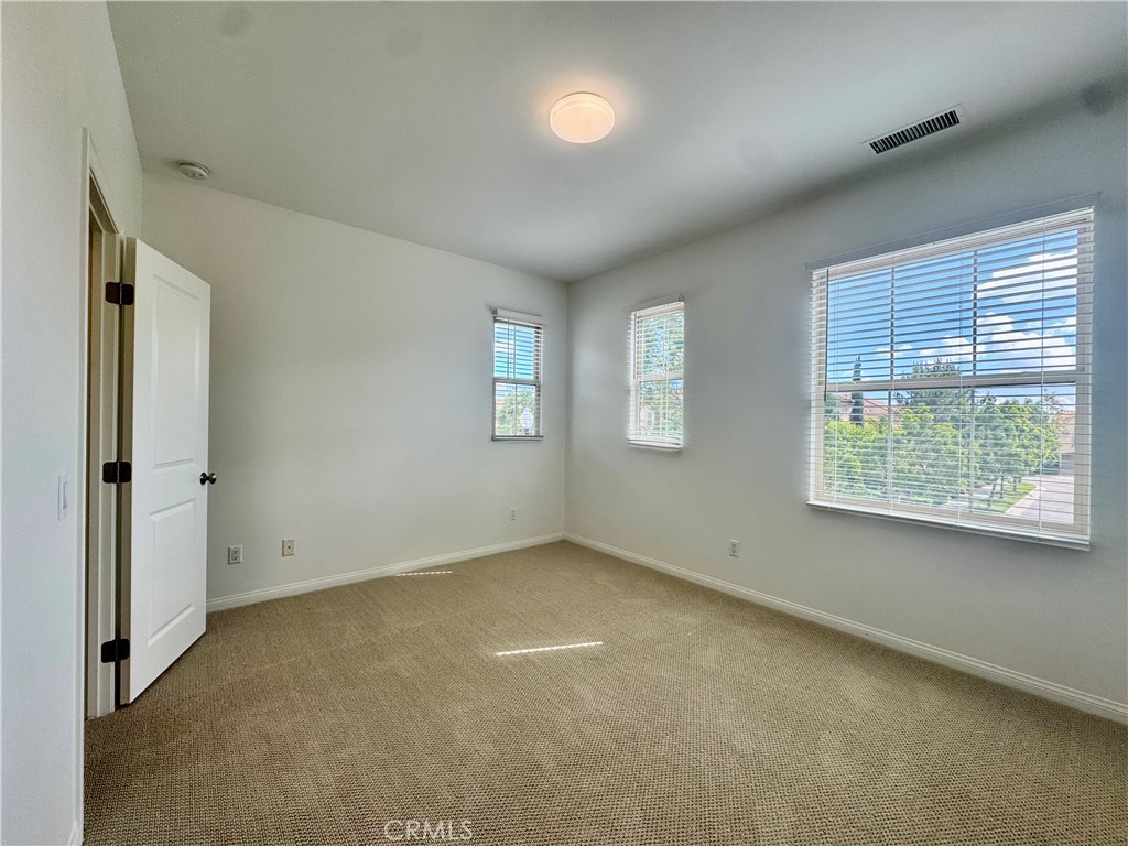 51 Elmdale Irvine, CA 92620 - Photo 28 of 41 an empty room with windows