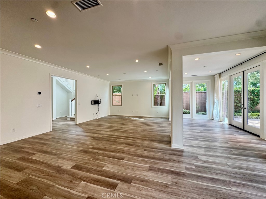 51 Elmdale Irvine, CA 92620 - Photo 6 of 41 a view of empty room with wooden floor and fan
