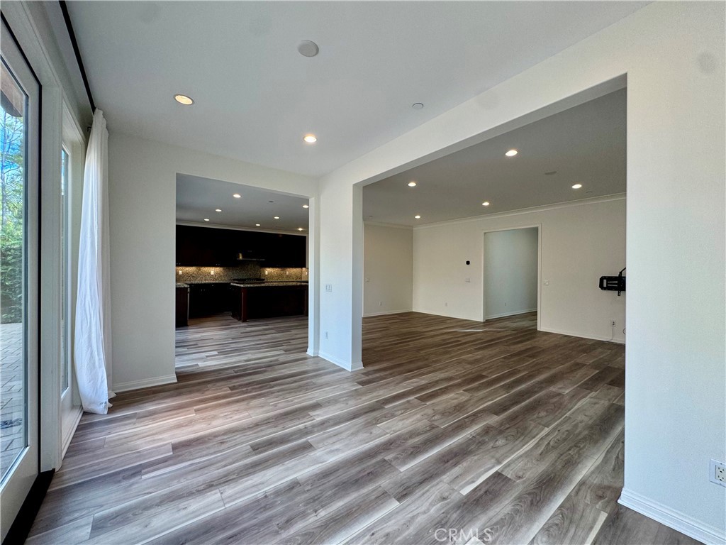 51 Elmdale Irvine, CA 92620 - Photo 10 of 41 a view of a hallway view with wooden floor and staircase