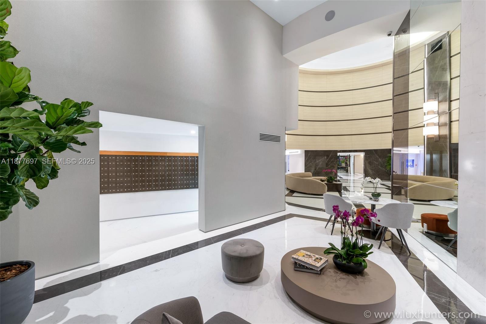 300 South Pointe Drive, Unit 2806 Miami Beach, FL 33139 - Photo 21 of 68 a dining room with furniture and a potted plant