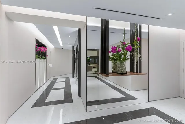 a view of a swimming pool with outdoor seating