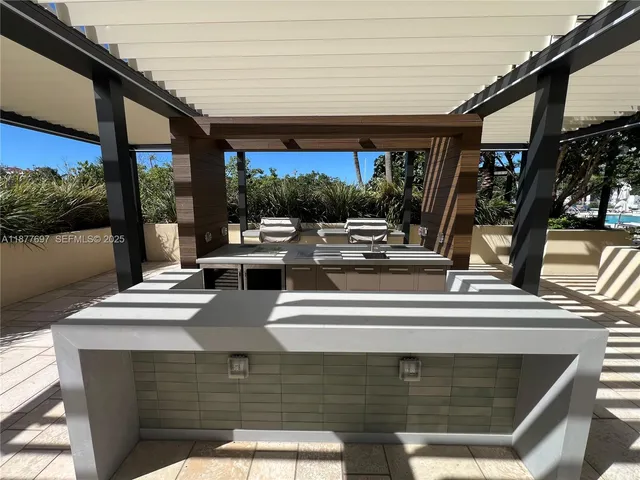 a view of a swimming pool with a yard