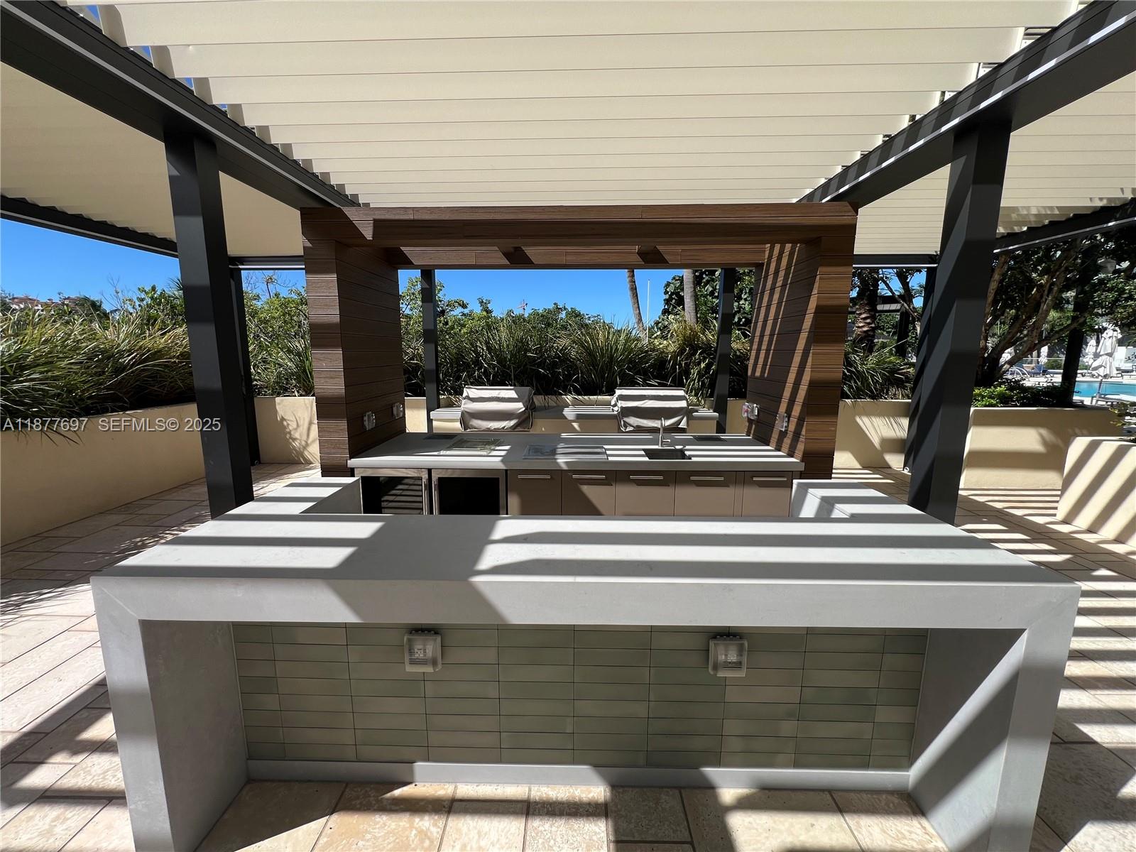 300 South Pointe Drive, Unit 2806 Miami Beach, FL 33139 - Photo 37 of 68 a view of kitchen with furniture and window