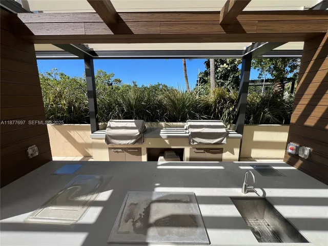 a view of a swimming pool with a terrace