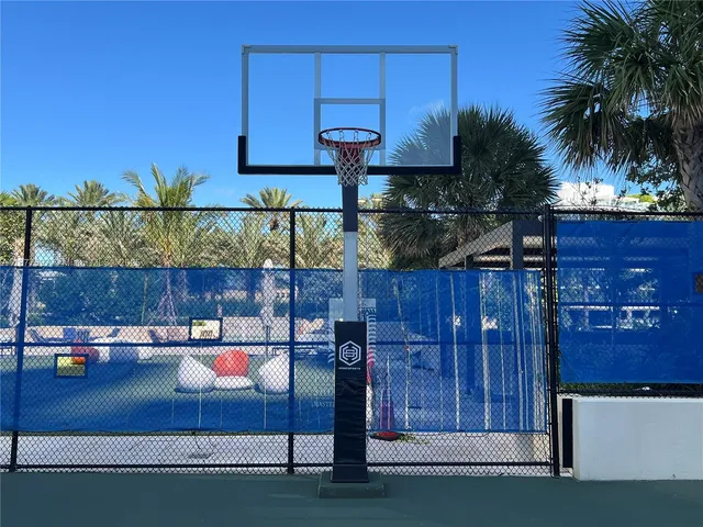 a view of a patio with couches and a fire pit