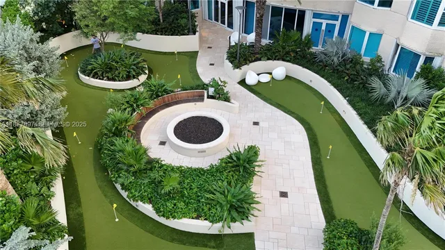 a view of a swimming pool with a lounge chair