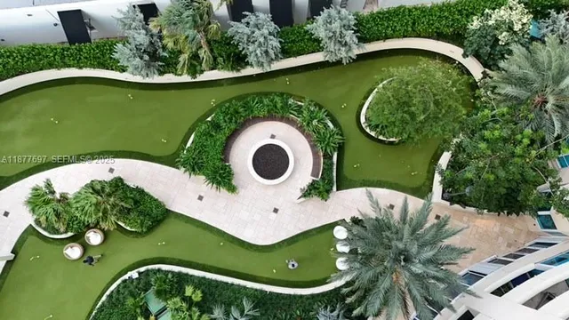 a view of a garden with a slide