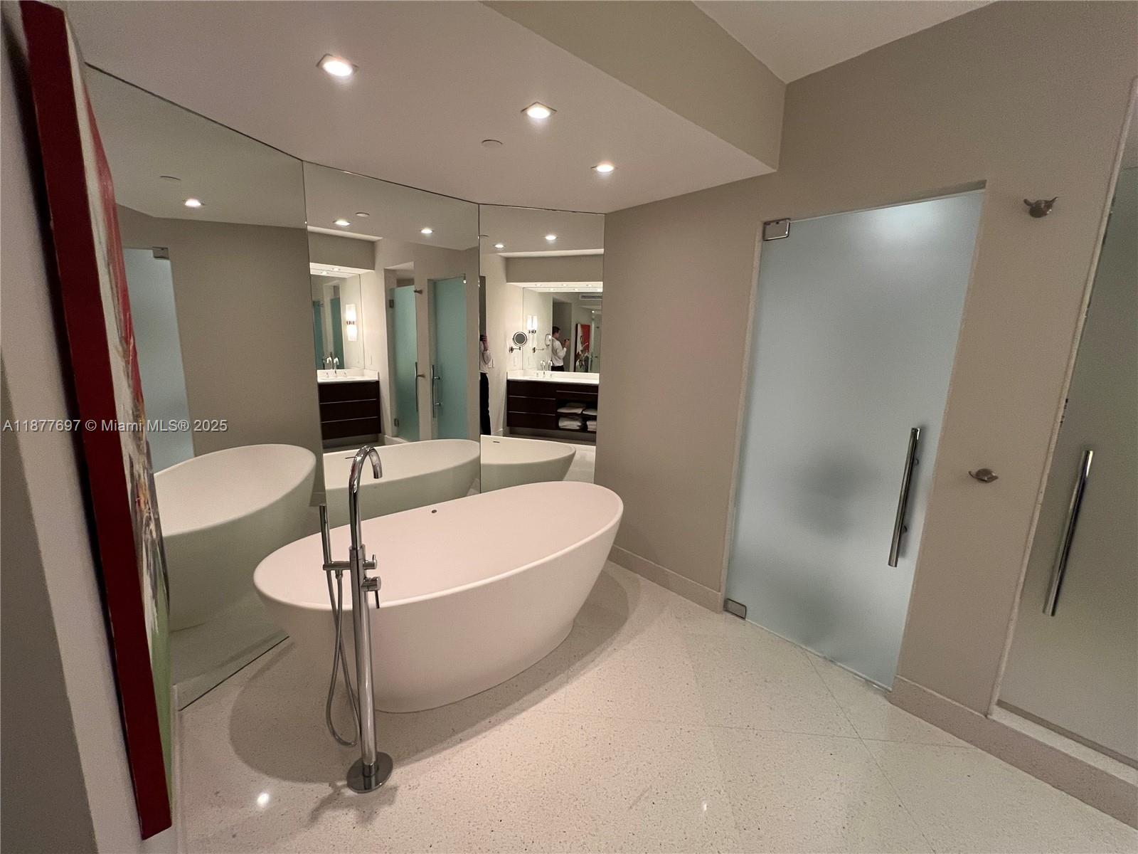 300 South Pointe Drive, Unit 2806 Miami Beach, FL 33139 - Photo 8 of 68 a large kitchen with a sink stainless steel appliances and a counter top space