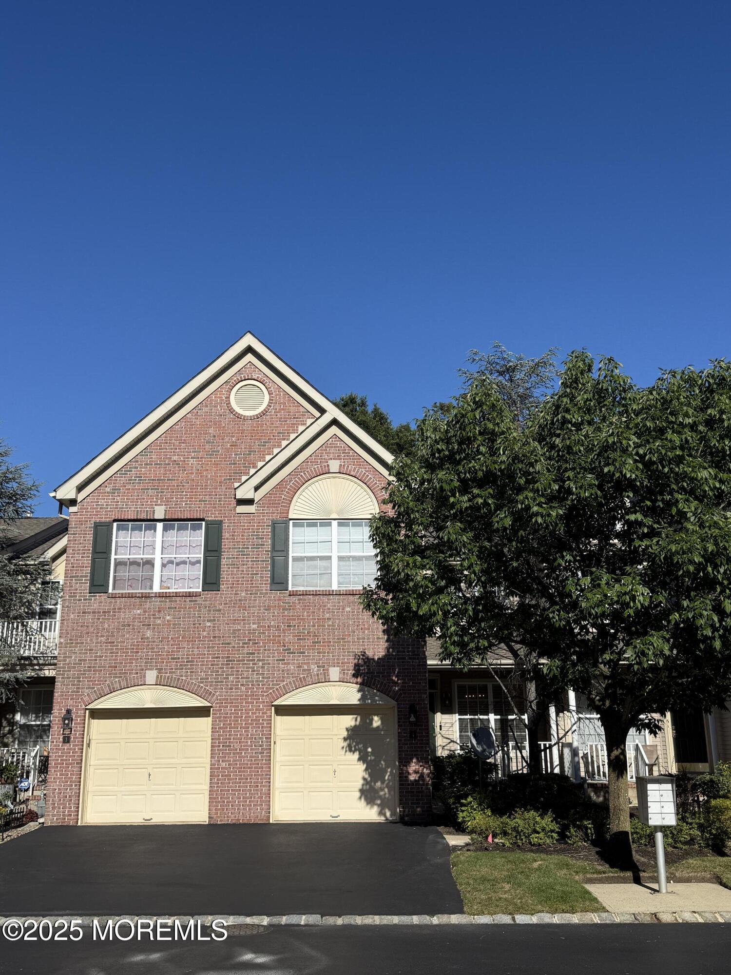 4 Pine Tree Terrace Holmdel, NJ 07733 - Photo 1 of 35 a front view of a house with a yard