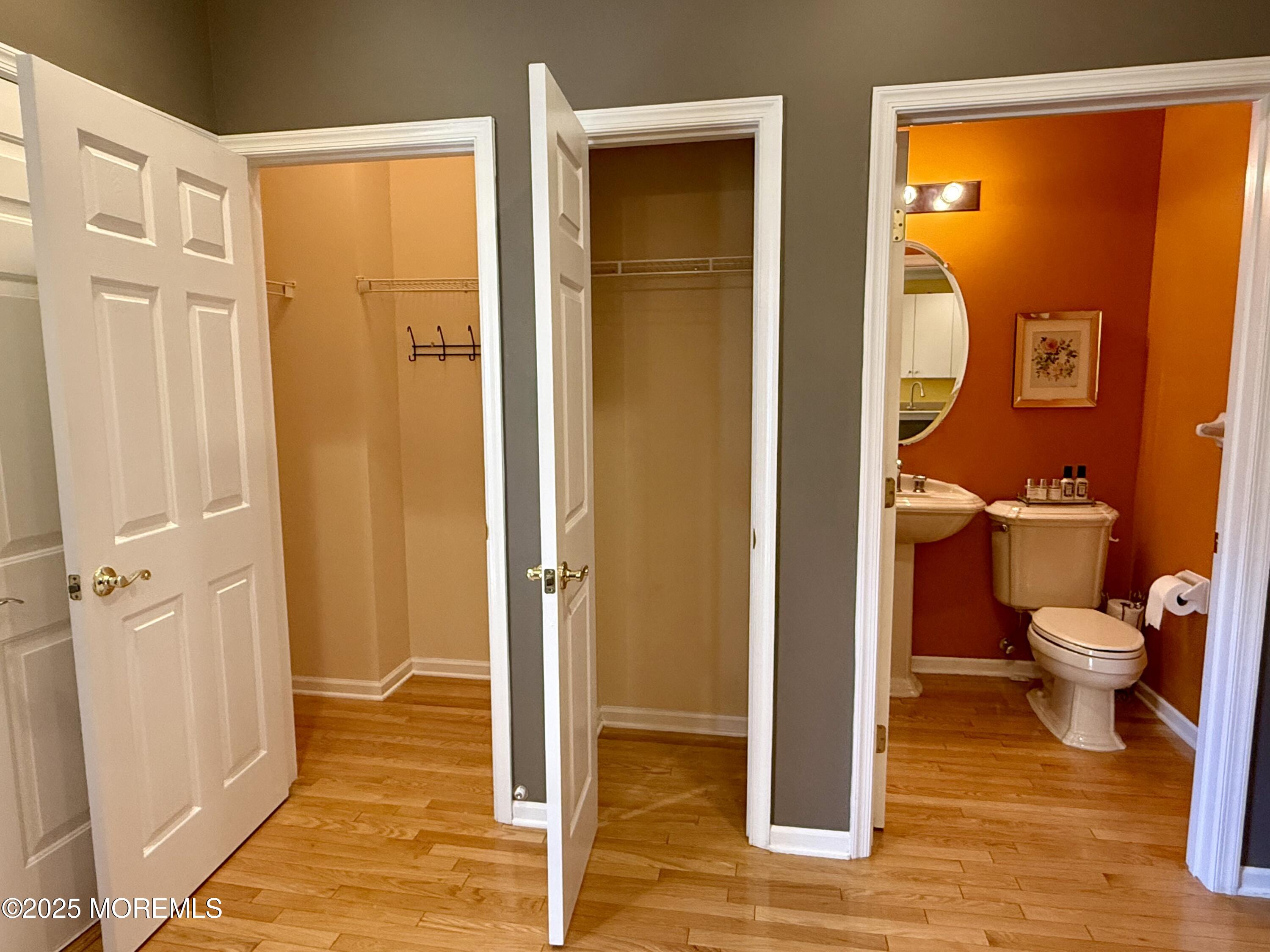 4 Pine Tree Terrace Holmdel, NJ 07733 - Photo 16 of 35 a bathroom with a glass door shower and a toilet