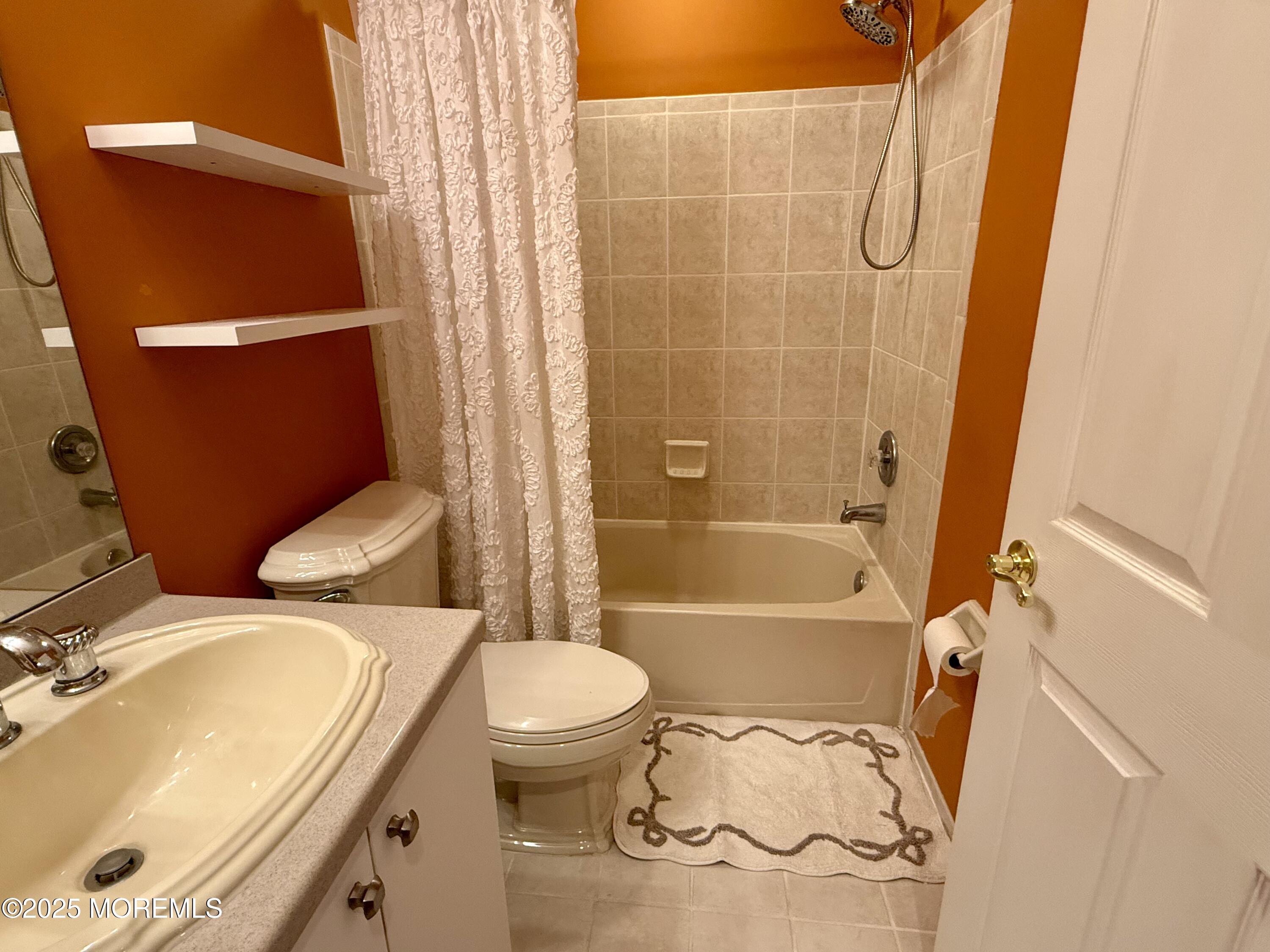 4 Pine Tree Terrace Holmdel, NJ 07733 - Photo 29 of 35 a bathroom with a sink toilet and shower