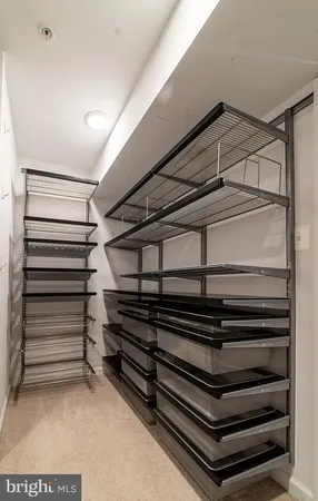 a view of an empty walk in closet
