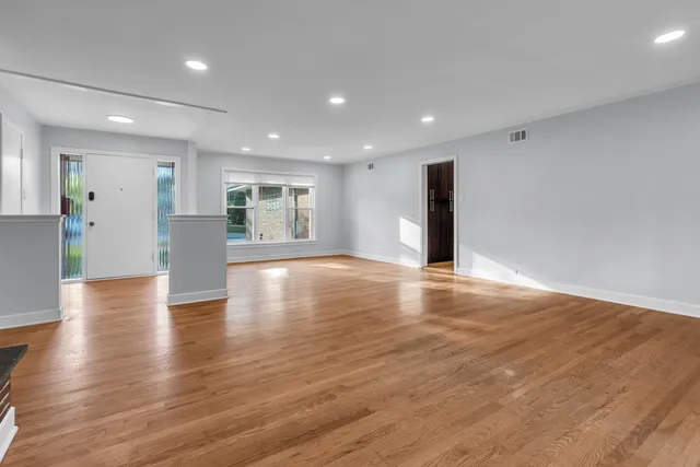 a view of a livingroom with wooden floor