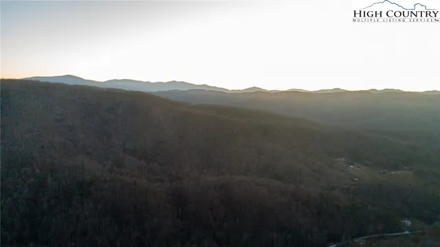 a view of a house with a mountain