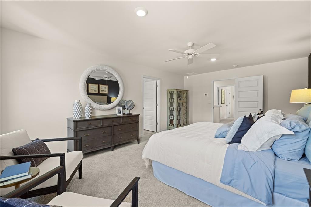 1191 Amerson Street Buckhead, GA 30625 - Photo 49 of 96 a bed room with a bed window and a chair