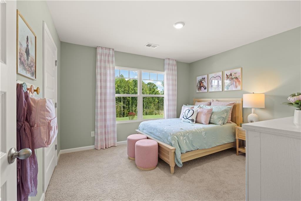 1191 Amerson Street Buckhead, GA 30625 - Photo 66 of 96 a spacious bedroom with a bed and a large window