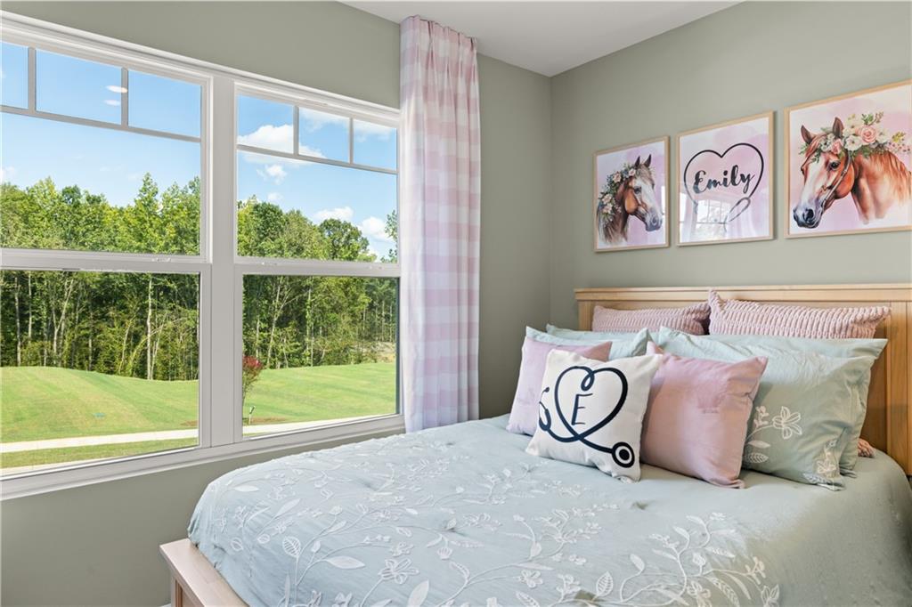 1191 Amerson Street Buckhead, GA 30625 - Photo 67 of 96 a bedroom with a bed and a large window with outer view