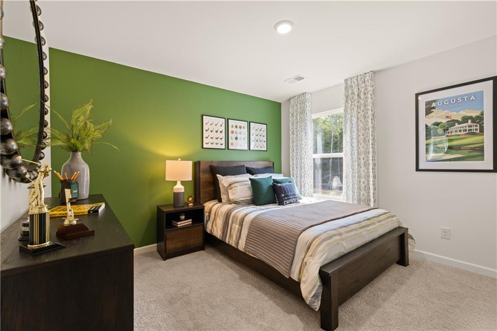 1191 Amerson Street Buckhead, GA 30625 - Photo 70 of 96 a bedroom with a bed and a window