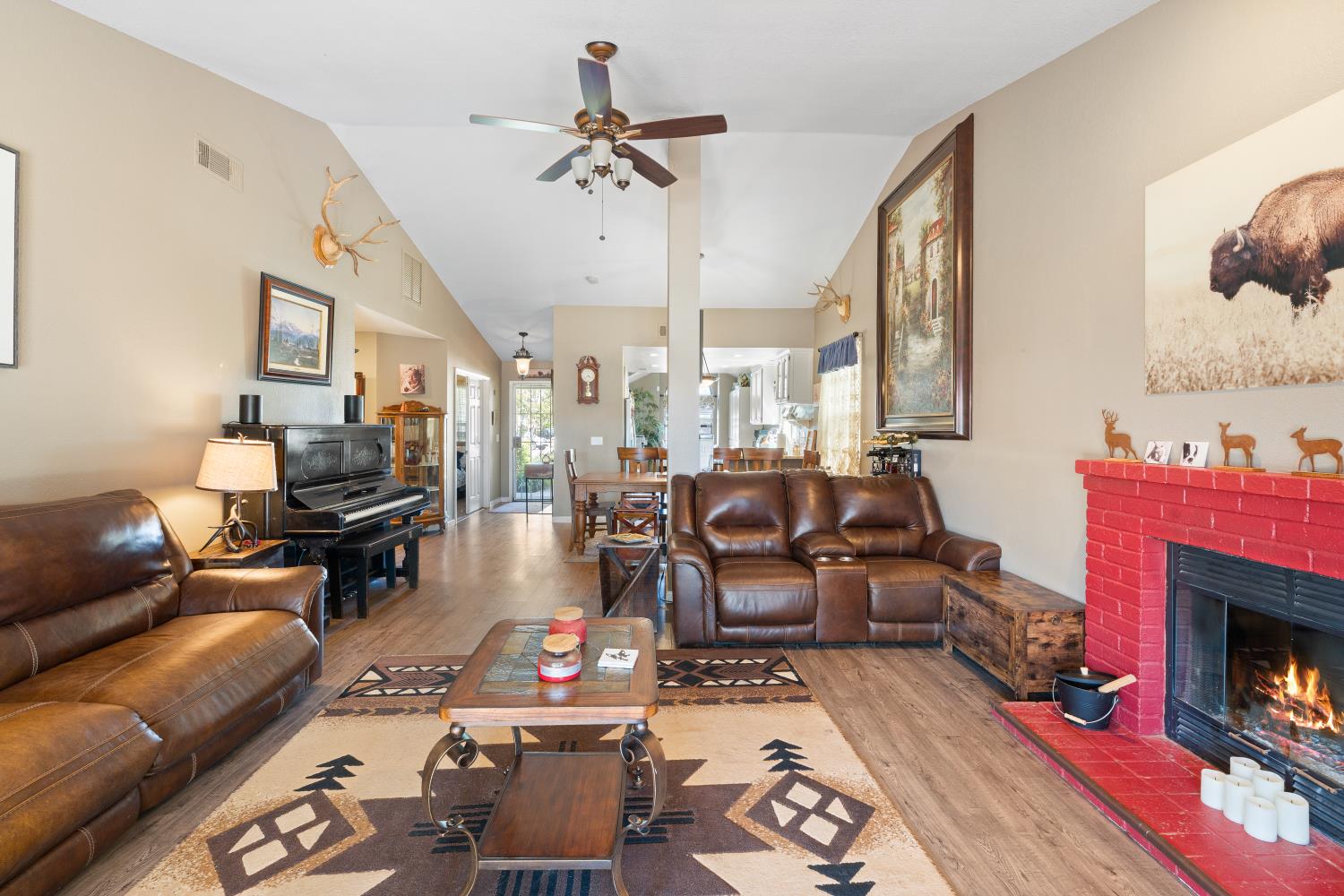 116 Fern Court Galt, CA 95632 - Photo 15 of 44 a living room with furniture and a fireplace
