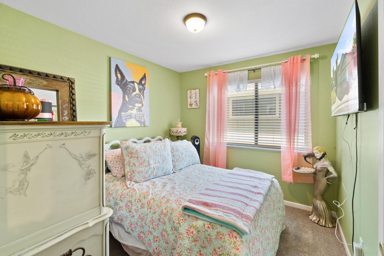 116 Fern Court Galt, CA 95632 - Photo 19 of 44 a bedroom with a bed and large windows