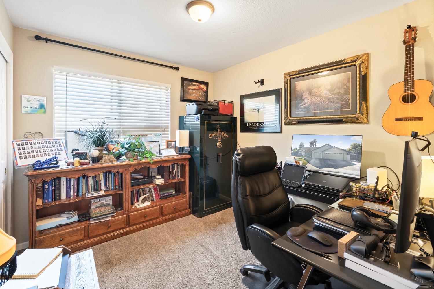 116 Fern Court Galt, CA 95632 - Photo 24 of 44 a workspace with furniture and a window
