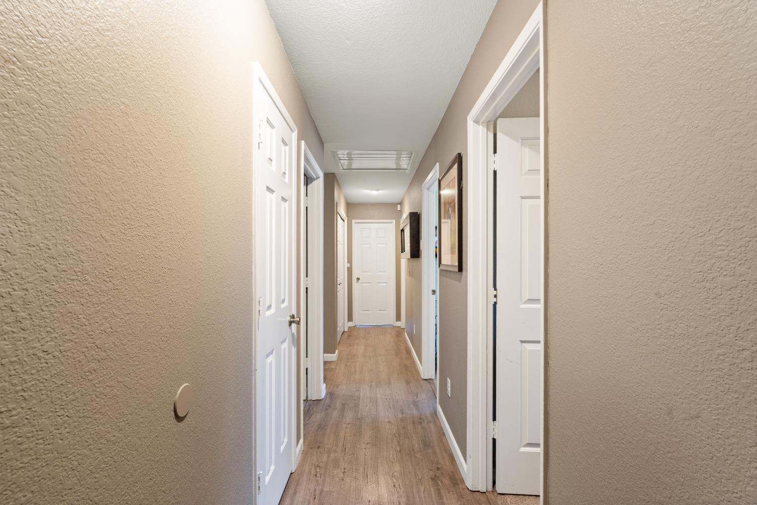116 Fern Court Galt, CA 95632 - Photo 26 of 44 a view of hallway with wooden floor